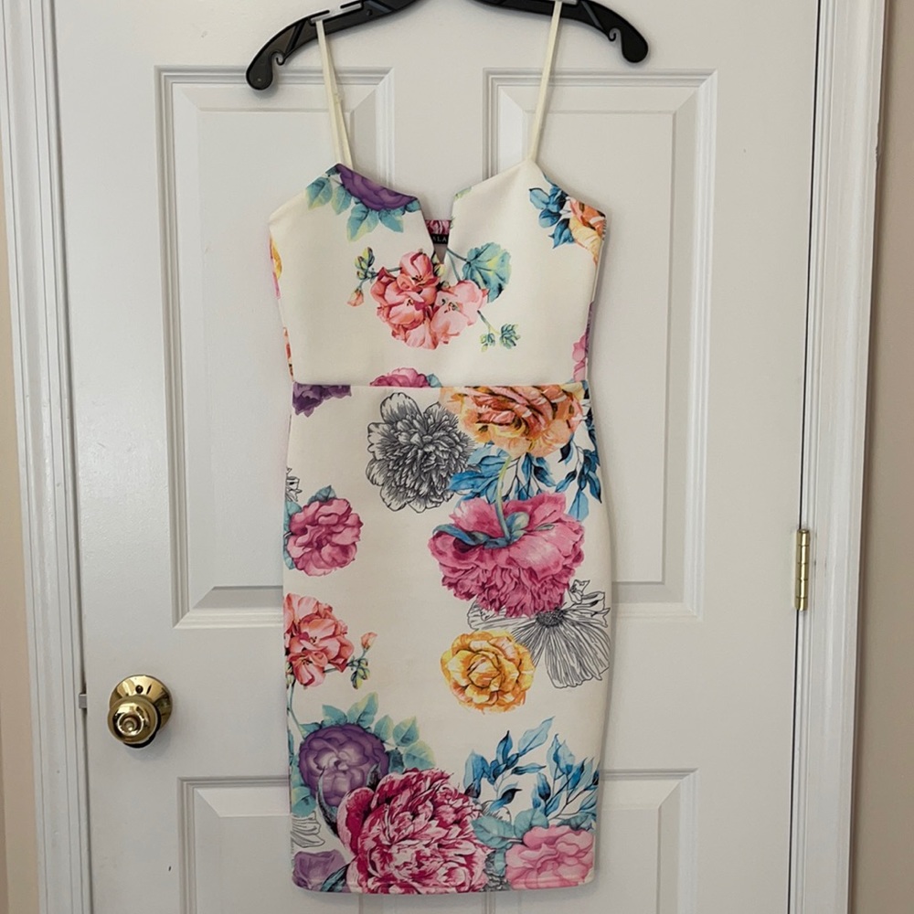 Off White color dress with multiple color flowers